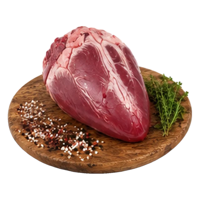 Helt oksehjerte på trefjøl med pepperkorn